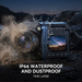 Rugged digital camera with water splashes and dust, showing IP66 waterproof and dustproof features, outdoors at night. TUTT