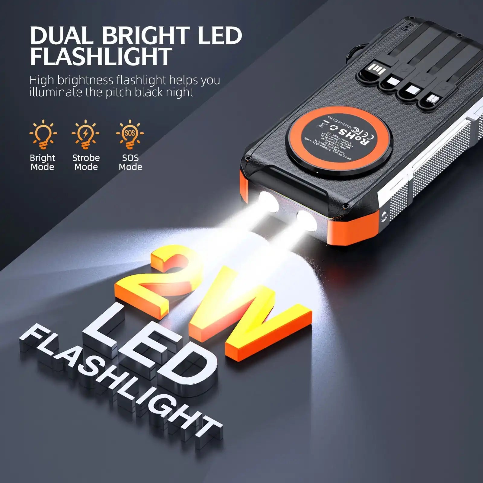 Rugged black and orange power bank with dual bright 2W LED flashlight emitting light, showing Bright, Strobe, and SOS modes TUTT