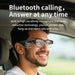 Man driving car wearing smart Bluetooth AI glasses with gradient lenses, smiling, TUTT