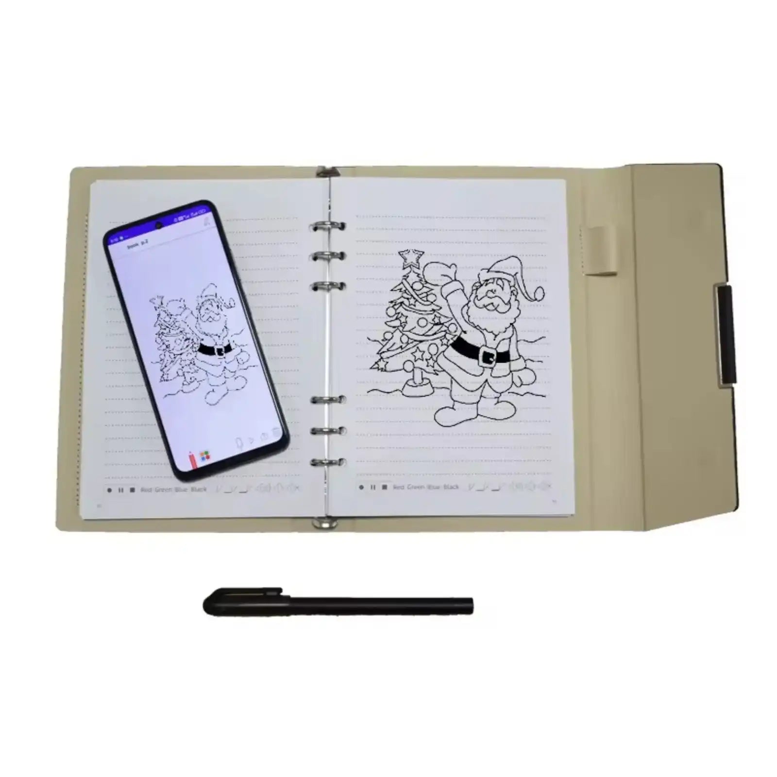 Open beige digital notebook with Santa Claus and Christmas tree drawing, smartphone displaying same image, black stylus pen below TUTT